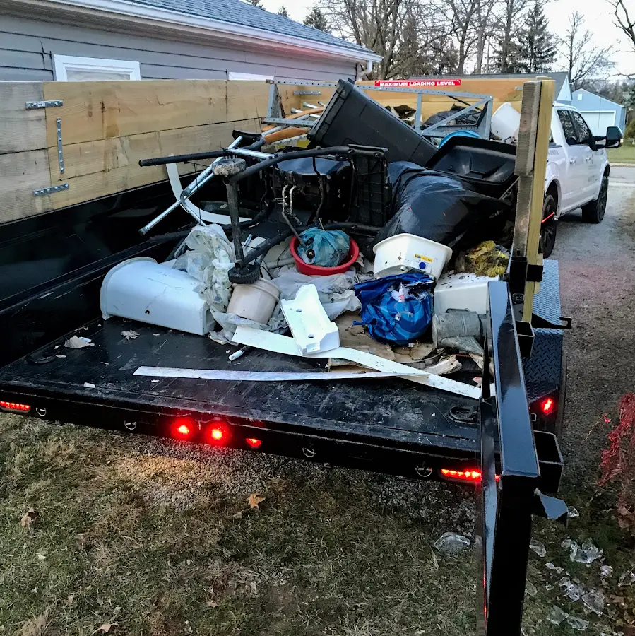 Roll-off dumpster delivered to a residential driveway in West Memphis